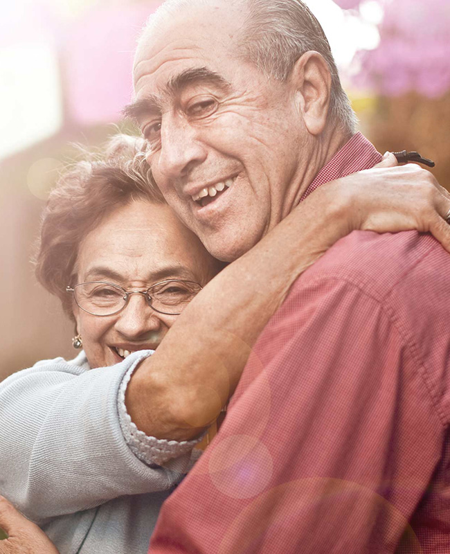 older couple embracing